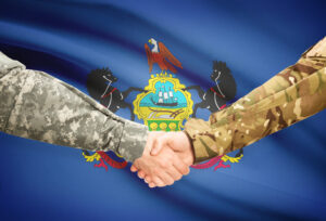 Soldiers handshake and US state flag - Pennsylvania